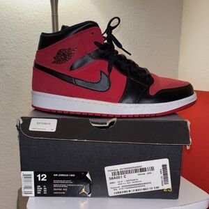 Jordan 1 Men's Mid-Top Sneakers in Red and Black